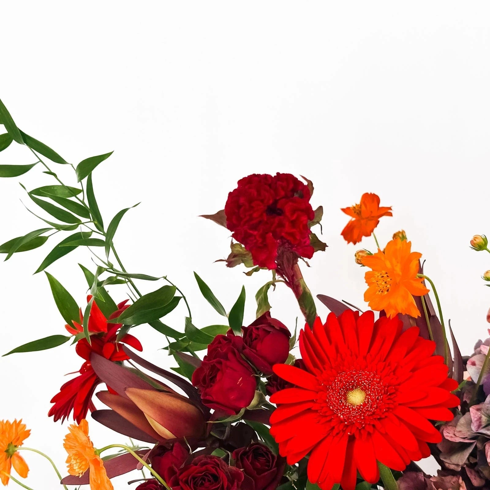 Elegant red and white flower arrangement with roses, orchids, and hydrangeas – Velour Rouge by Flowers Valley