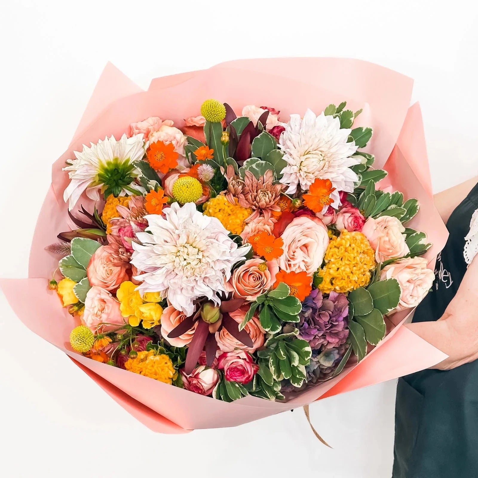 Sunset Splendor bouquet with roses, dahlias, hydrangeas, and celosia in vibrant sunset tones – next day delivery Bay Area