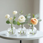 Stylish table bud vases set of three with pastel roses and greenery on a round table – Flowers Valley
