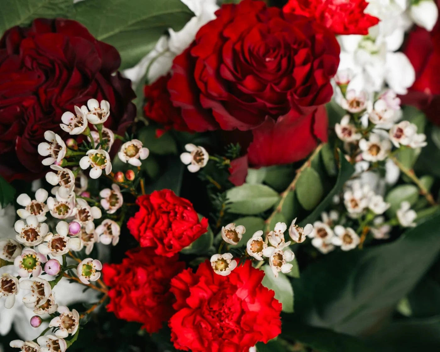 Romantic bouquet of red roses, carnations, and white flowers for Alameda flower delivery – Flowers Valley