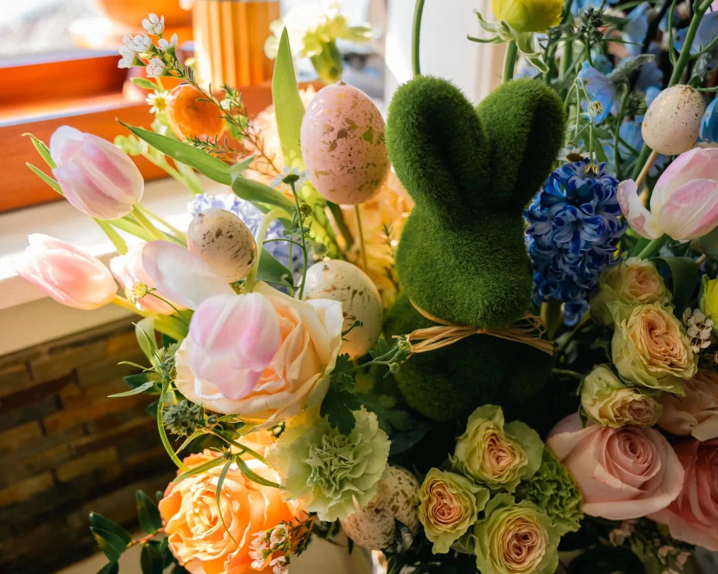 Spring bouquet with tulips, roses, and Easter accents for Berkeley flower delivery – Flowers Valley