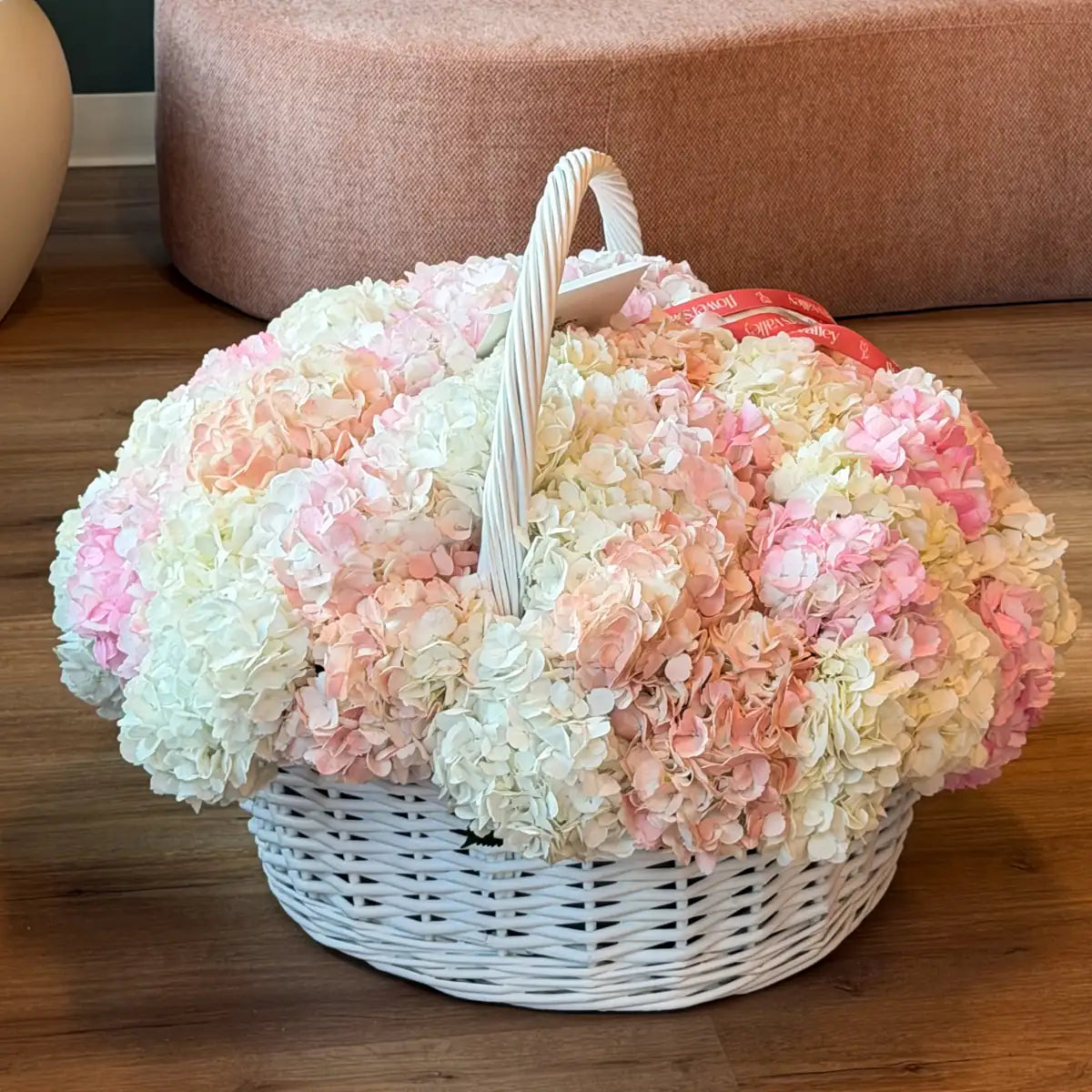 Blush Cumulus hydrangea basket styled in a modern interior, same-day flower delivery in the San Francisco Bay Area