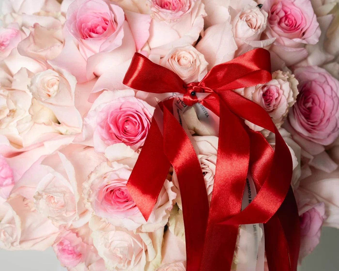 Romantic bouquet of pink and white roses with red ribbon in Calistoga – Flowers Valley flower delivery