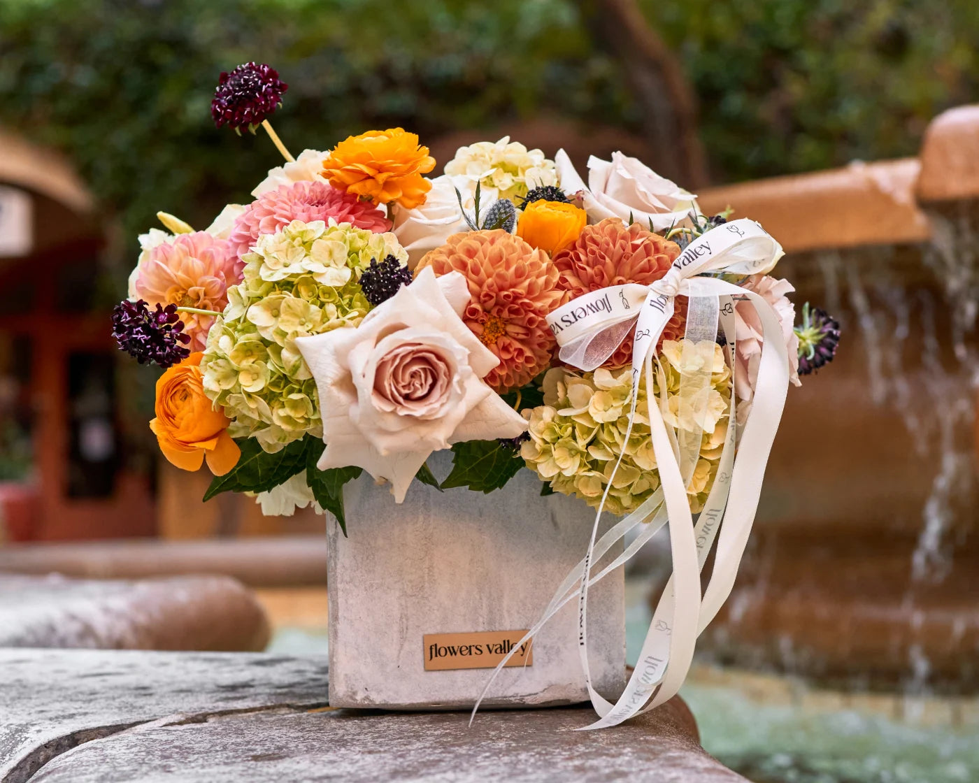 Elegant luxury flower arrangement in a white box with roses, ranunculus, and hydrangeas – same-day flower delivery in Richmond, CA by Flowers Valley