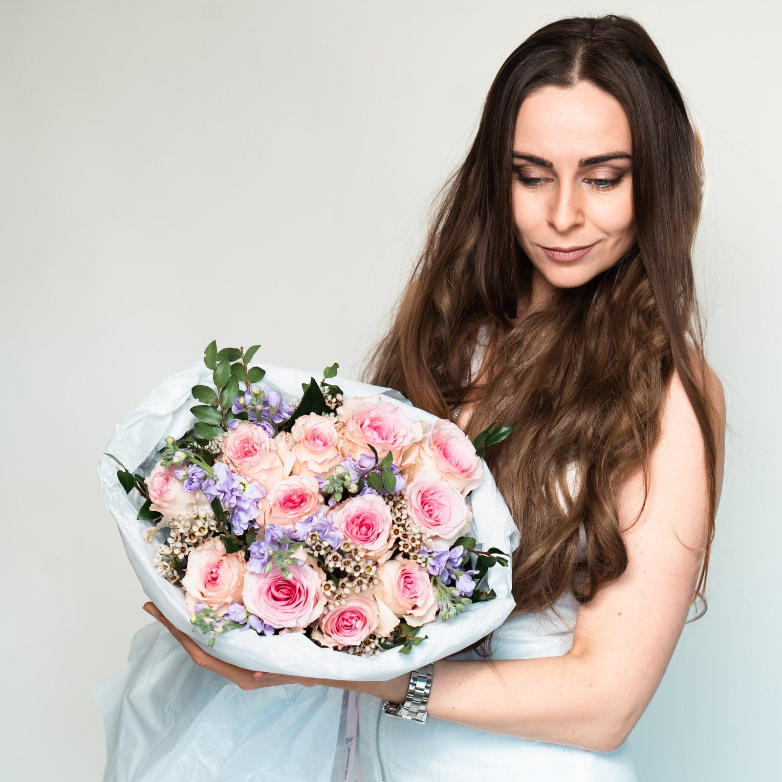 Freshly wrapped pink rose bouquet from Flowers Valley, your local Concord florist for reliable delivery.