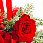 Close-up of red rose and evergreen accents in Holiday Glow Centerpiece