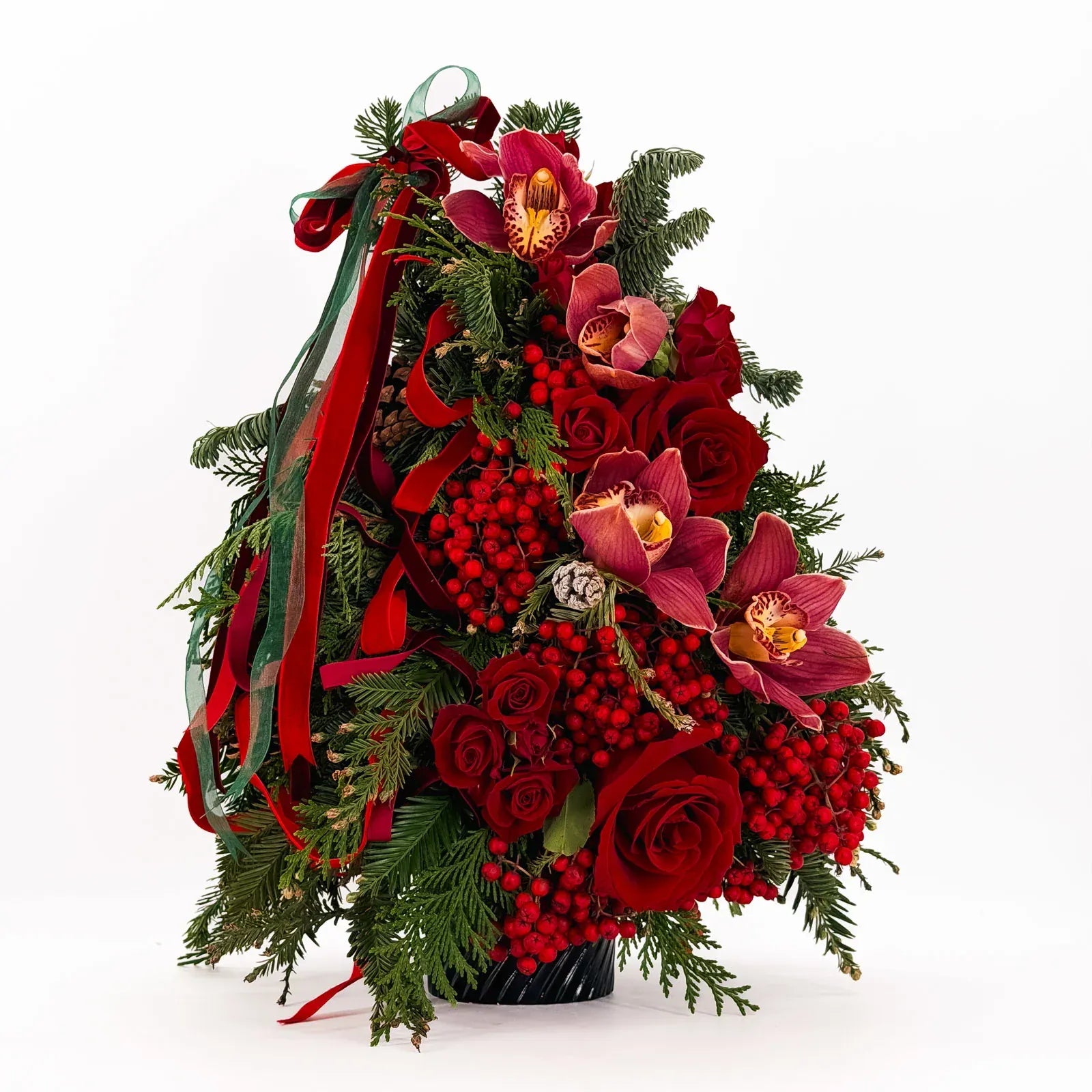 Holiday Orchid Rose Tree with red roses, cymbidium orchids, berries, and festive ribbons