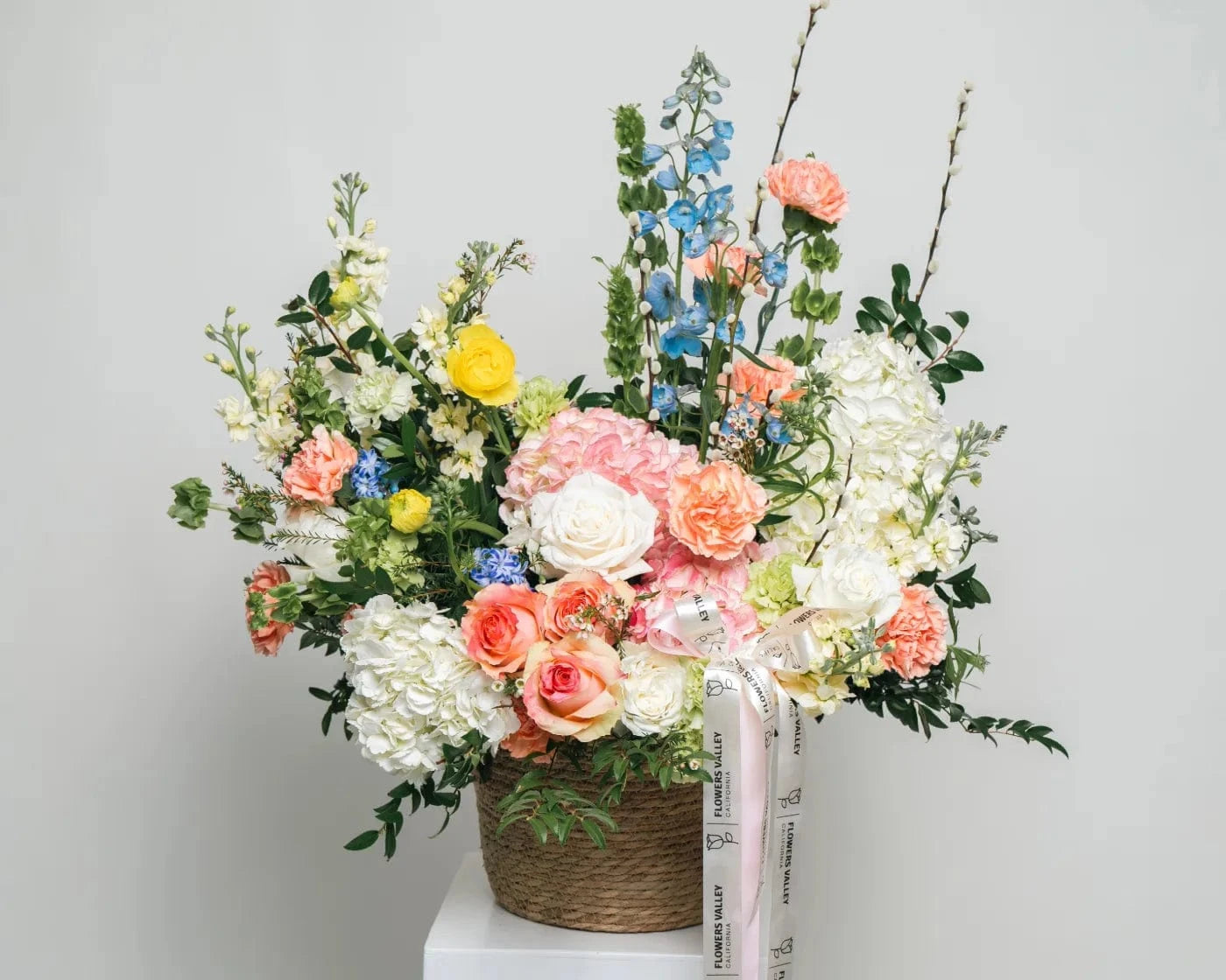 Elegant pastel flower arrangement with roses, peonies, hydrangeas, and delphiniums – Flowers Valley flower delivery in Redwood City, CA