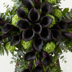 Close-up of calla lilies forming a floral cross
