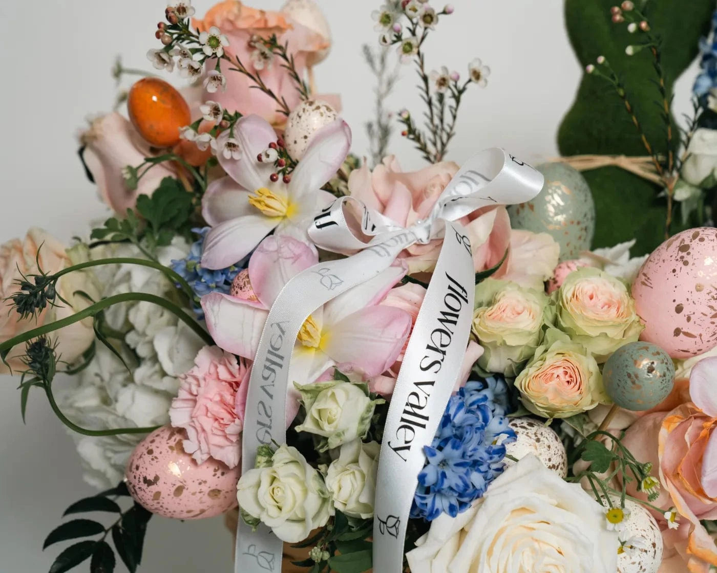 Spring bouquet with pastel roses, seasonal flowers, and Easter accents in Newark – Flowers Valley delivery