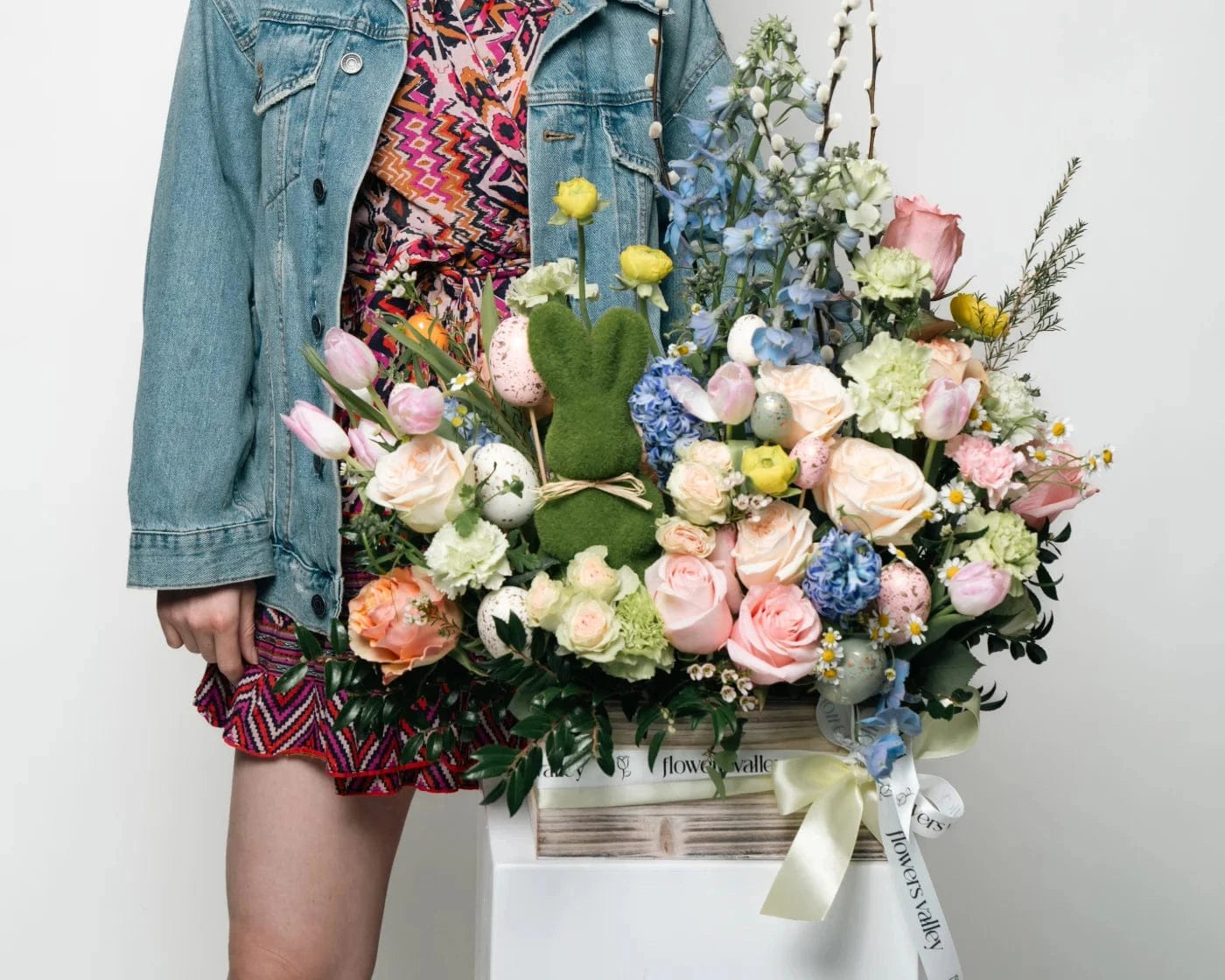 Colorful pastel flower arrangement with roses, ranunculus, hydrangeas, and delphiniums in a wooden box – Flowers Valley flower delivery in Belmont, CA